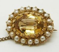 Victorian brooch set with an oval cut citrine surrounded by pearls, 1.8 x 1.5cm