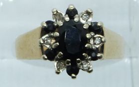 A 9ct gold ring set with sapphires and diamonds, 4.8g, size O/P