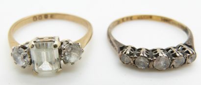 A 9ct gold ring set with paste and an 18ct gold and silver ring set with paste, 4.4g