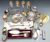 A quantity of silver plated and other metalware including set of four retro champagne flutes, tea