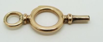 Victorian yellow metal watch key with unusual hook, possibly for case opening, 3.8cm long