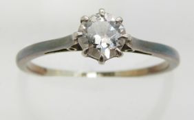An 18ct white gold ring set with a diamond of approximately 0.4ct, 1.8g, size O