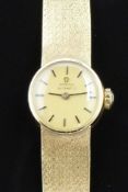 Omega 18ct gold ladies automatic wristwatch ref. 7218 with black hands and baton markers, gold