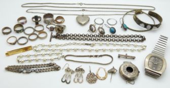 A collection of silver jewellery including rings, 9ct gold and silver eternity ring, 9ct gold