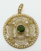 Edwardian 15ct gold pendant set with a round cut tourmaline and seed pearls, 3.1cm diameter