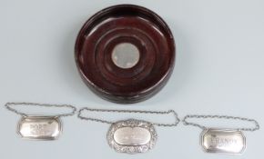 Three various hallmarked silver bottle tickets or labels comprising Brandy, Port and Glenfiddich