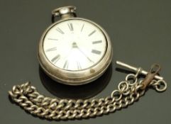 An early 19thC hallmarked silver open faced pair cased pocket watch with gold hands, black Roman