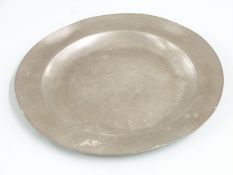 Pewter plate with London touch marks to reverse of rim, diameter 23.5cm