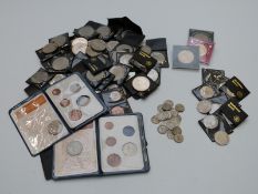 A collection of largely modern commemorative crowns together with 'First Decimal' sets and