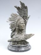 A bronze bust of a native American Indian Chief with eagle, on a circular marble plinth, H34cm