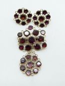 Victorian brooch set with with foiled garnets and matching earrings