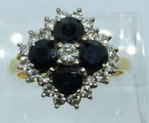 An 18ct gold ring set with sapphires, each approximately 0.4ct, and diamonds, 6.7g, size O/P