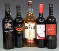 Five bottles of various wines and spirits including Bell's Scotch Whisky, 1L, 40% vol, Taylor's
