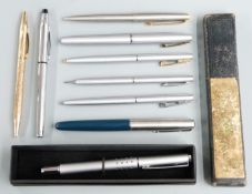 Nine pens and pencils including Sheaffer White Dot fountain pen with brushed stainless steel body