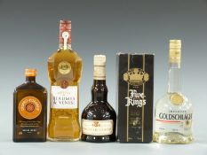 Five assorted bottles of spirits and liqueurs comprising L'Esprit de L'orange de luxe liqueur,
