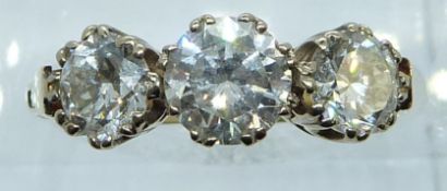 An 18ct gold ring set with three round cut diamonds of approximately 1ct, 0.6ct & 0.6ct, 3.9g,