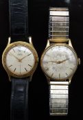 Two Smiths Astral gentleman's wristwatches each with gold hands and baton markers, silver dials
