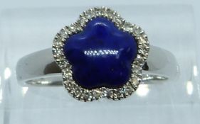 A 9ct white gold ring set with lapis lazuli and diamonds, 2.9g, size P/Q