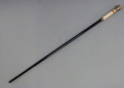 Carved ivory handled walking cane or stick with yellow metal pierced collar, the Victorian