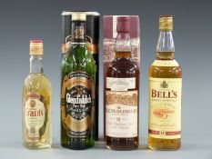 Four bottles of Scotch Whisky comprising Glendronach Traditional 12 year old Single Highland Malt,