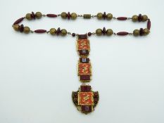 A 1920s Czech necklace made up of engraved beads and glass