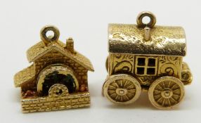 A 9ct gold charm in the form of a mill with moving water wheel and a 9ct gold charm in the form of a