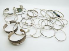 A collection of silver bangles