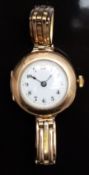 Vintage 9ct gold ladies wristwatch with blued hands, black Arabic numerals, white enamel dial and