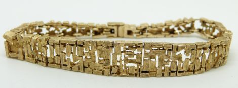 A 9ct gold mid century modern textured and pierced bracelet, London 1967, 17.5g