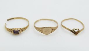 Three 9ct gold rings, 1.8g