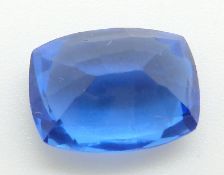 A loose cushion cut sapphire measuring approximately 7.25ct