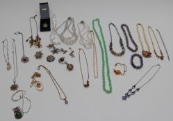 A silver thistle brooch, silver filigree items, crystal necklace, silver St Christopher, vintage