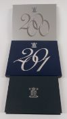 Three Royal Mint cased UK Proof sets for the Millennium year 2000, 2001 and 1999, with certificates