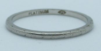 A platinum ring/ wedding band, 2.6g, size R