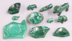 A collection of malachite including carved animals, pin trays and ashtrays
