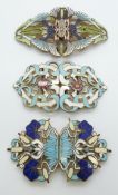 Three Art Nouveau enamel belt buckles