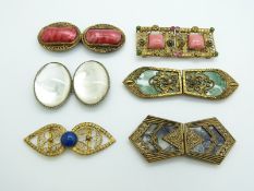 Five Czechoslovakian buckles set with glass and plastic