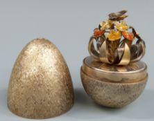 Stuart Devlin limited edtition hallmarked silver gilt egg with bark effect exterior and butterfly