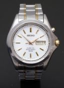 Seiko Kinetic gentleman's automatic wristwatch ref. 5M43-0F30 with day and date aperture, gold hands