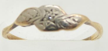 A 9ct gold ring set with a diamond, 1.1g, size K