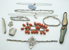 A collection of silver jewellery including fob, chatelaine, bracelets, necklace, Edwardian vesta