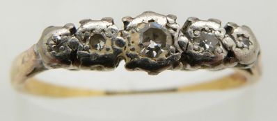 An 18ct gold ring set with five diamonds in a platinum setting, 1.7g, size J