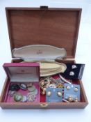 A collection of costume jewellery to include Victorian paste brooch, other brooches including