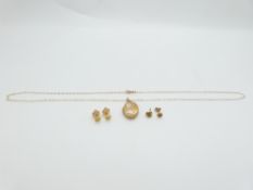 Two pairs of 9ct gold earrings and a 9ct gold chain and locket, 1.9g