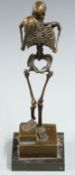 Carl Kauba bronze figure of a skeleton holding a skull, signed to base, on stepped plinth, H32cm