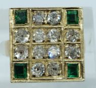A yellow metal early 20thC ring set with old cut diamonds, each approximately 0.12ct and four