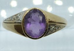 A 9ct gold ring set with an oval amethyst and diamonds, 2.6g, size N