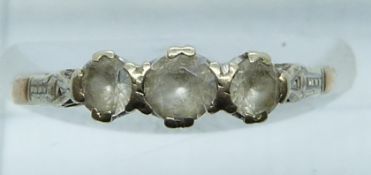 A 9ct gold ring set with synthetic white sapphires, 1.9g, size K/L