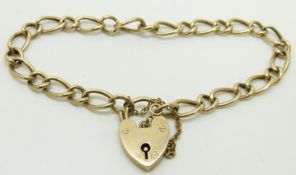 A 9ct gold curb link bracelet with heart padlock, 6.9g