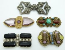 Five Czechoslovakian buckles set with various cabochons and paste